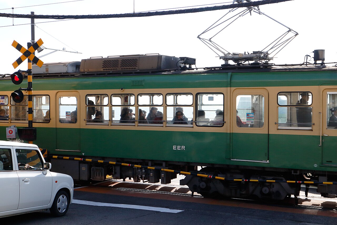 Enoden train passing Kamakura-Koko-Mae crossing on the Shonan coast