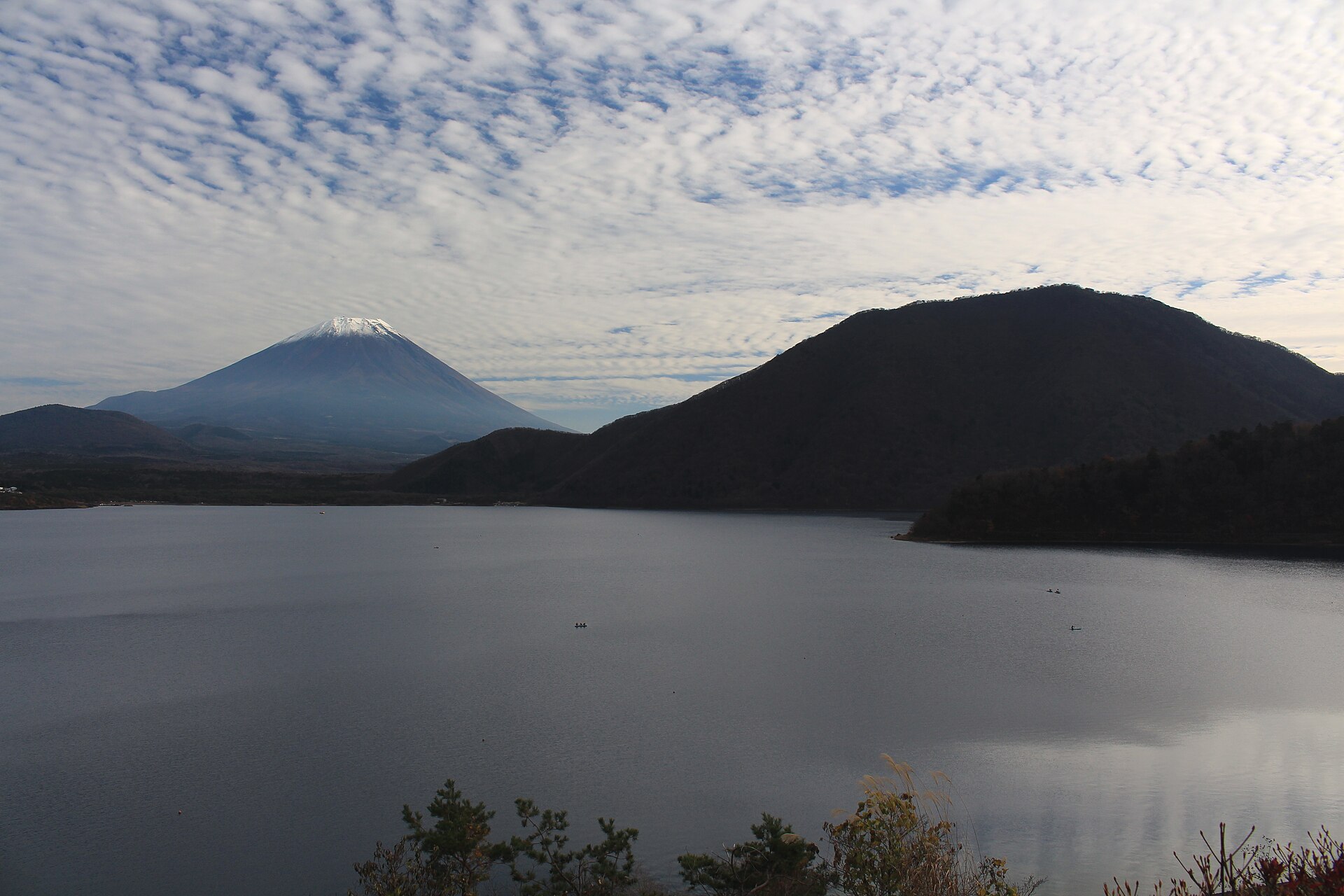 Mount Fuji and Mount Ryu seen across Lake Motosu in late autumn