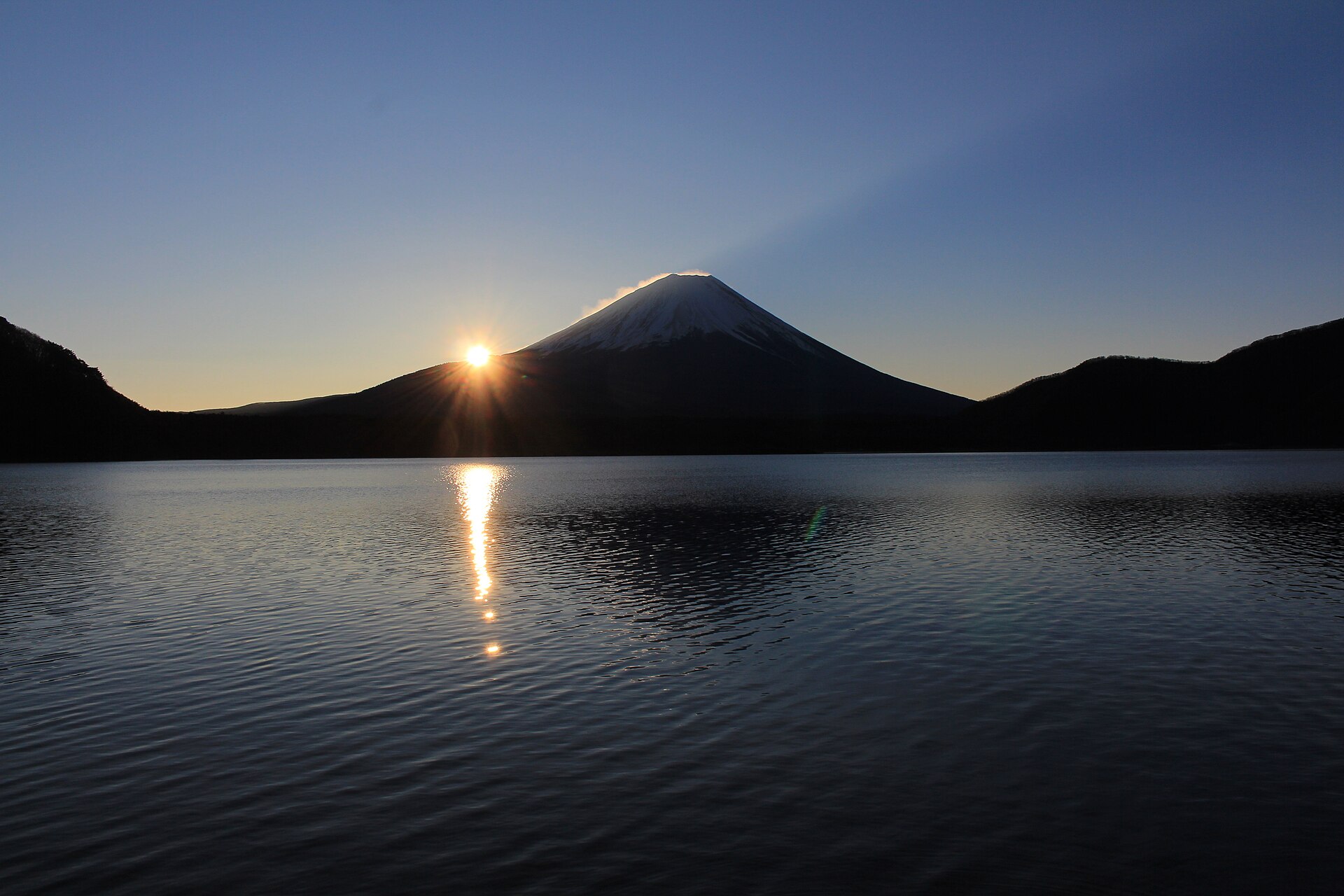 Morning light and Mount Fuji seen across Lake Motosu
