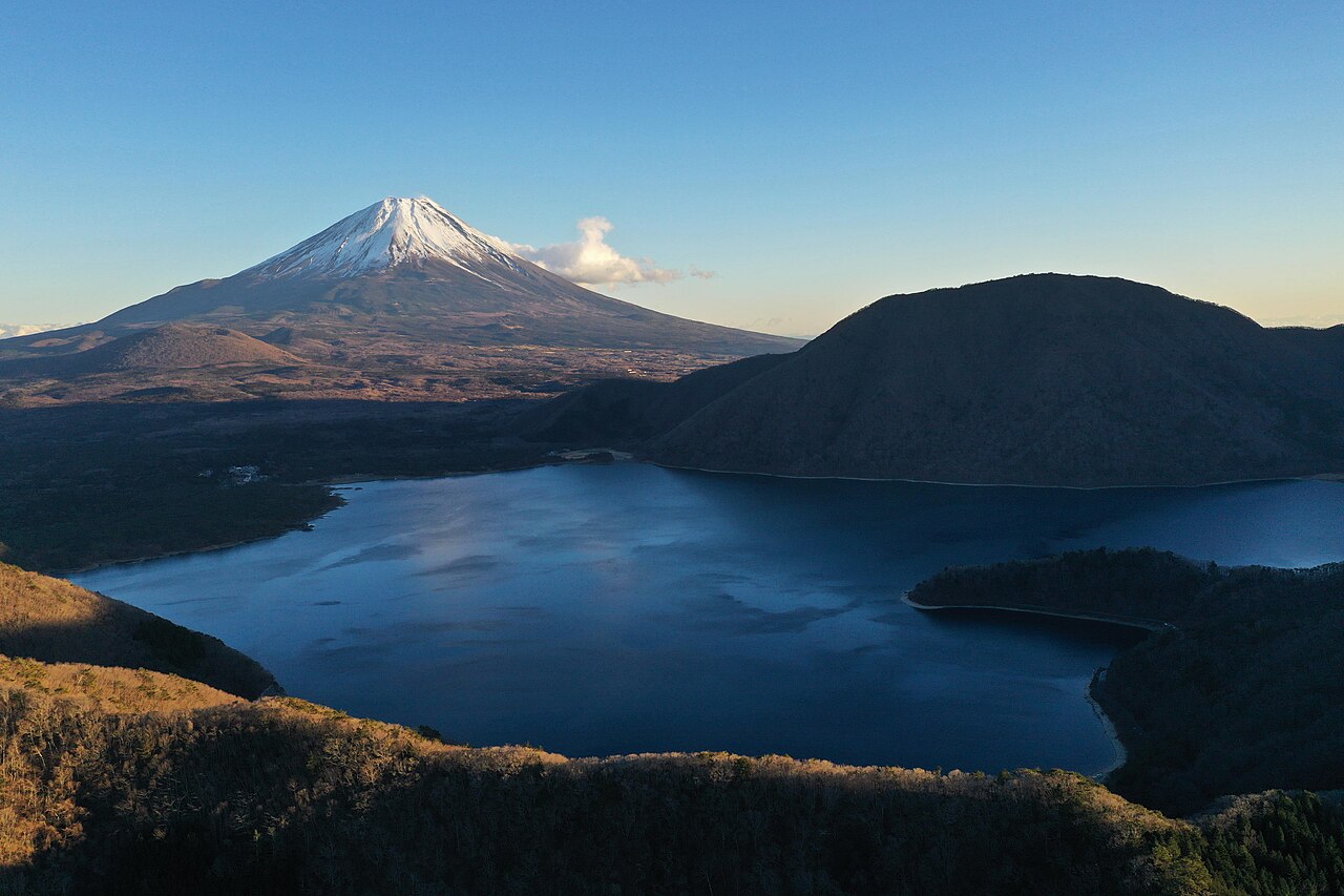 Snow-covered Mount Fuji and Lake Motosu in winter