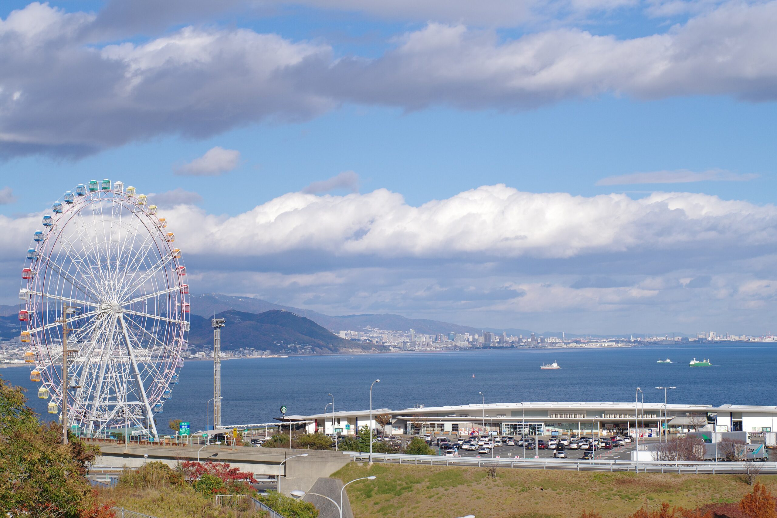 A view from Awaji Service Area with the Ferris wheel and sea